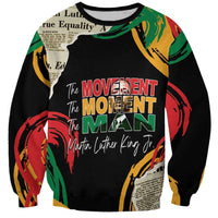 Unisex black sweatshirt with multicolor “The Movement…The Man” MLK graphic front