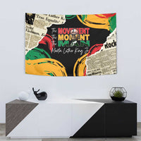 Black MLK legacy tapestry with colorful graphic print and bold red/green lettering