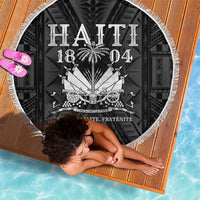 Fringed round beach blanket showing “HAITI 1804” text and crest design