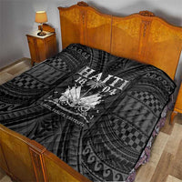 Haiti 1804 quilt on bed, dark black fabric with “HAITI 1804” and balloon artwork