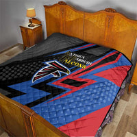 Cricket quilt blanket on bed: black backing with Falcons logo and blue/red diagonals