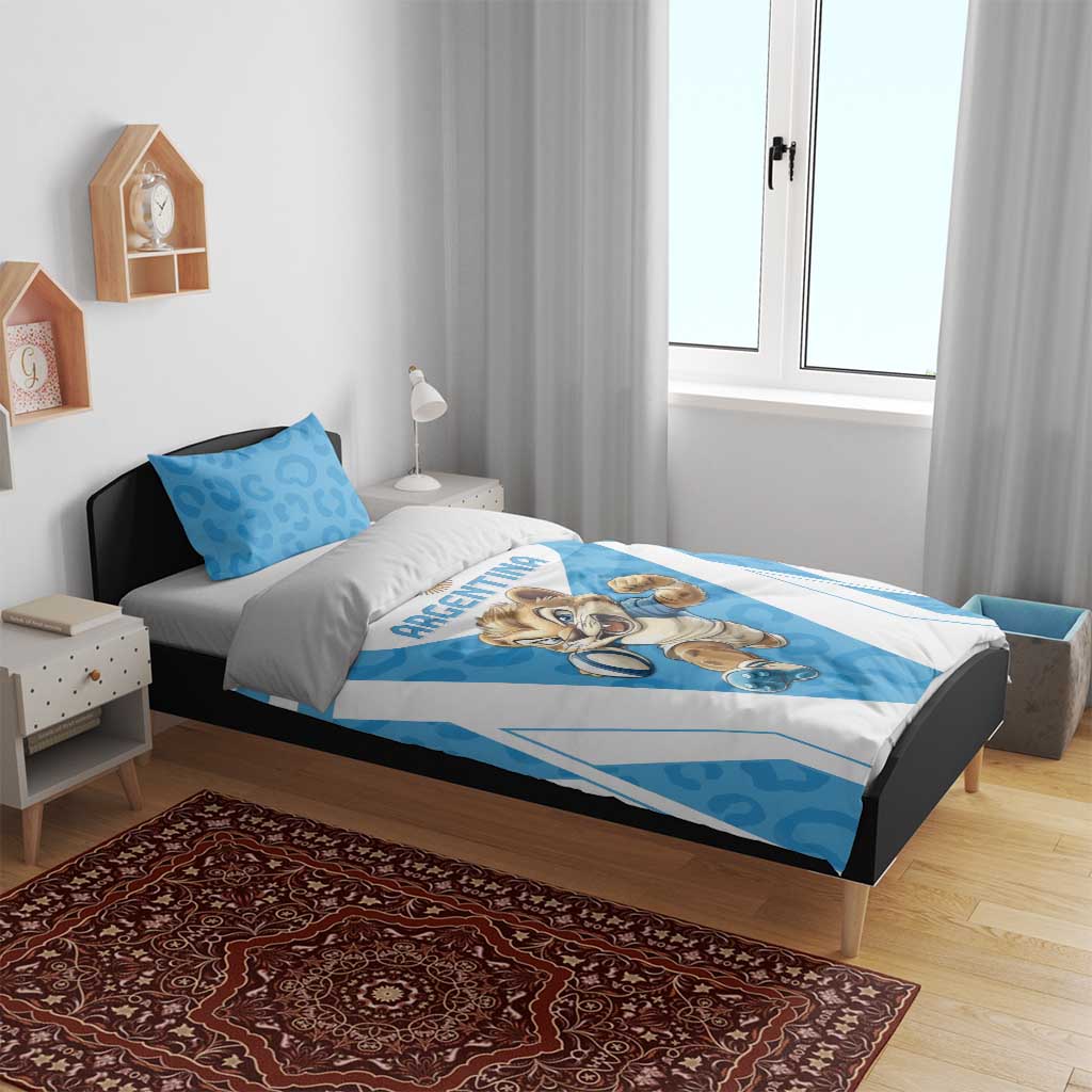 Blue and white Argentina bedding set on bed, leopard mascot duvet with matching pillowcases.