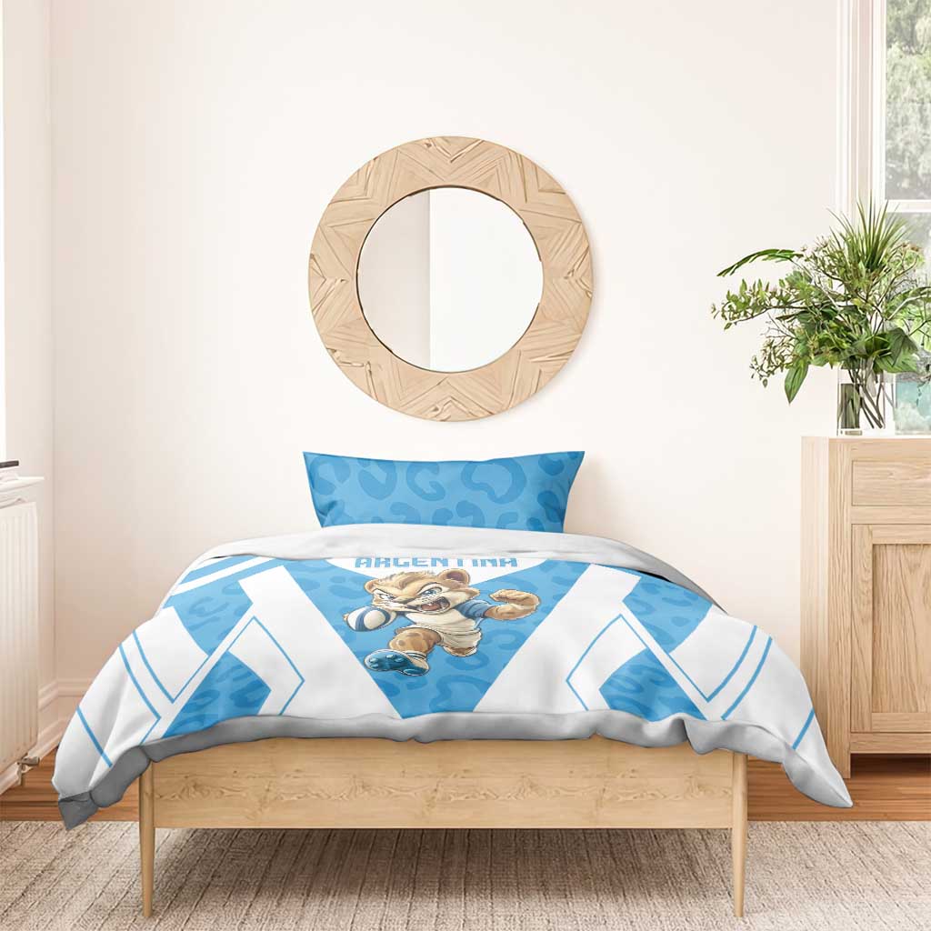 Blue and white Argentina bedding set with leopard mascot on duvet and striped chevron frame.