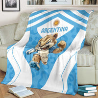 Blue-and-white Argentina blanket with chevron stripes and running cartoon mascot