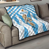 Blue and white Argentina rugby quilt on sofa with centered cartoon Pumas mascot