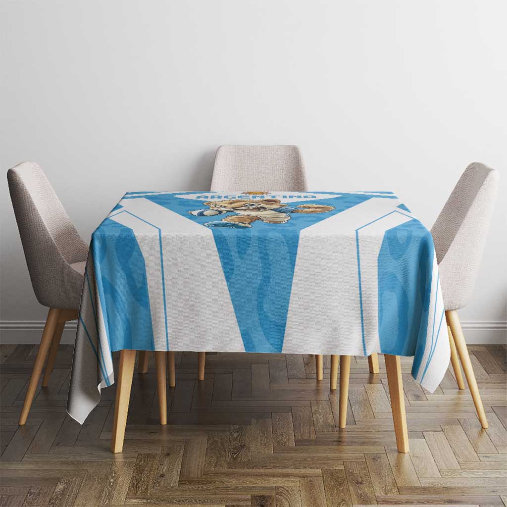 Blue and white rugby tablecloth on round dining table with chair set