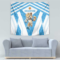 Blue and white Argentina tapestry over sofa, central logo and running mascot graphic