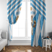 Blue and white striped window curtains with cartoon rugby mascot and centered emblem