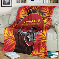 Red cricket blanket with tropical fan pattern and Knight Riders rider illustration
