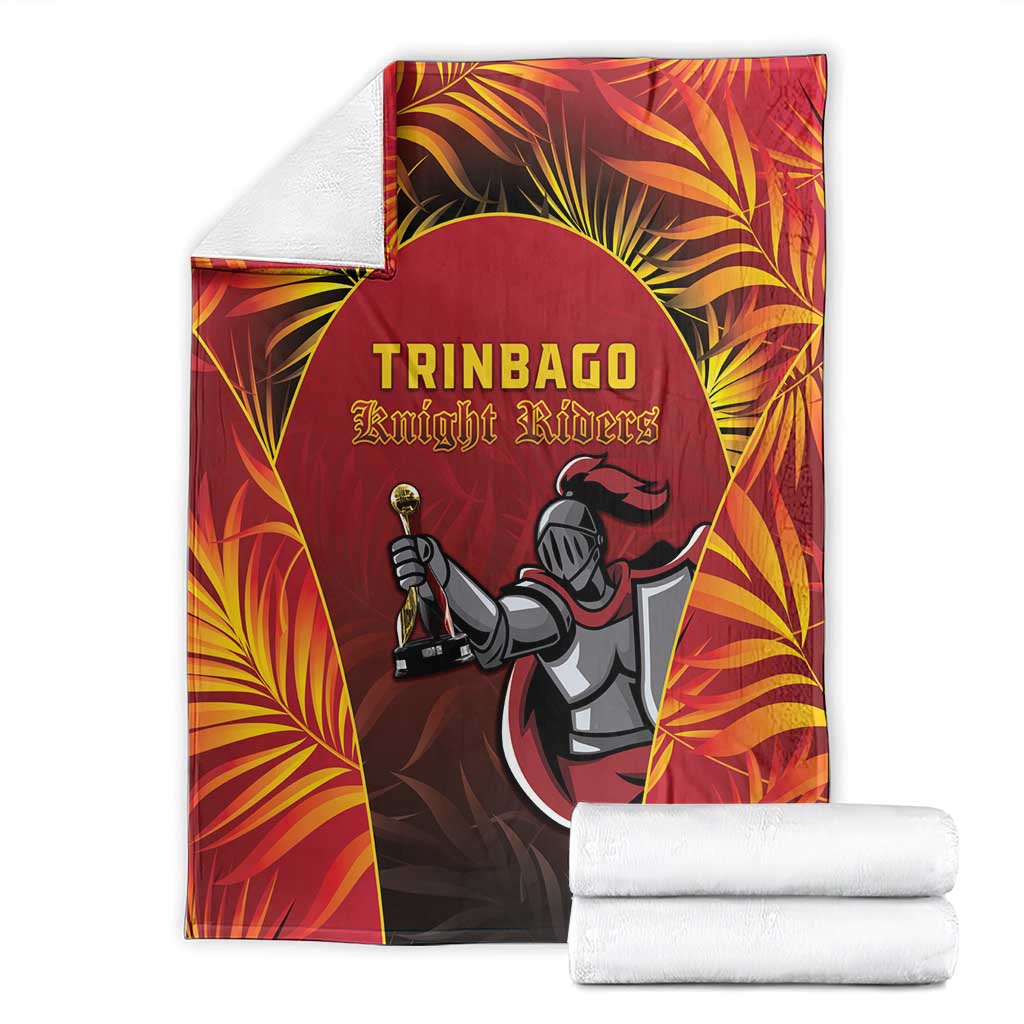 Red cricket blanket folded with Knight Riders rider logo and tropical pattern