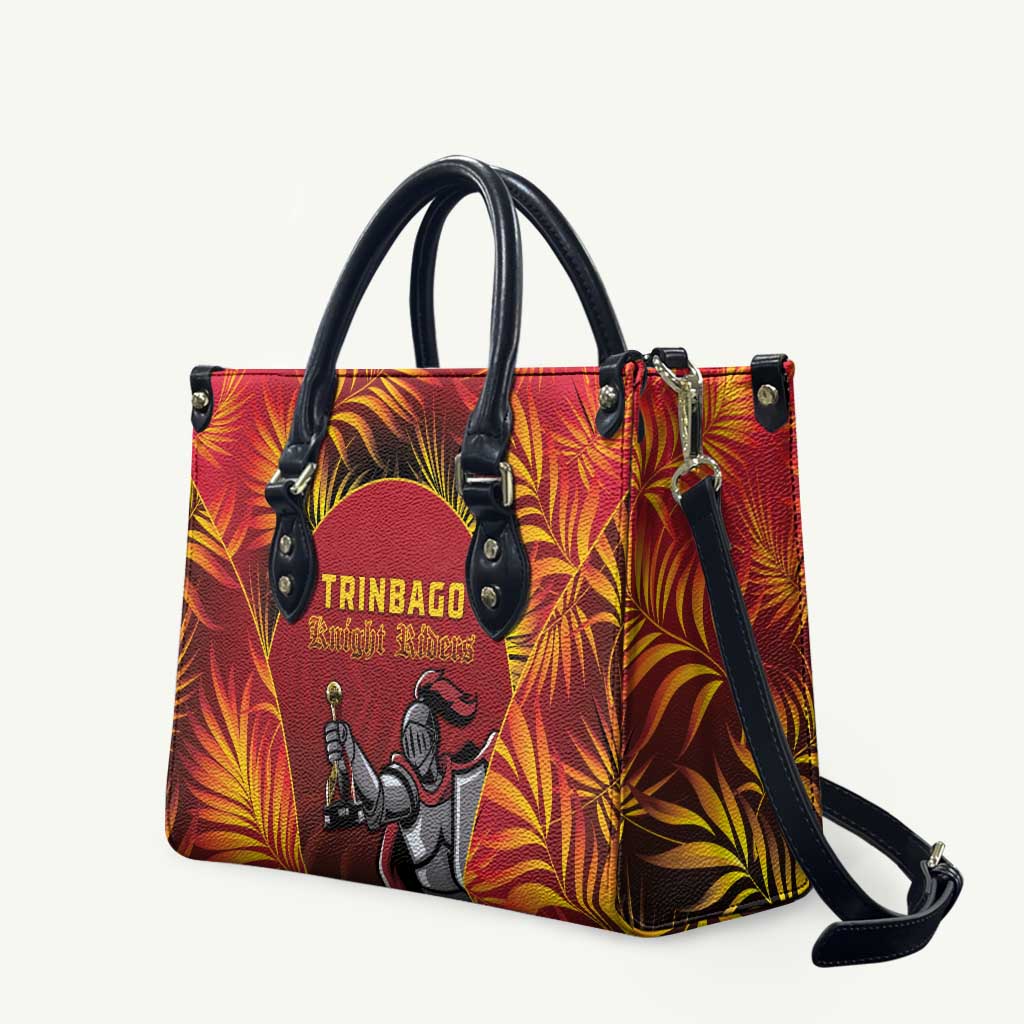 Red tote bag with black top handles and shoulder strap; TRINBAGO Knight Riders logo