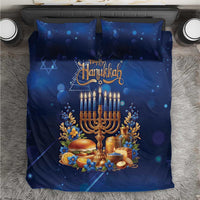 Blue Hanukkah bedding set with menorah, candles, and Happy Hanukkah design on duvet and pillows