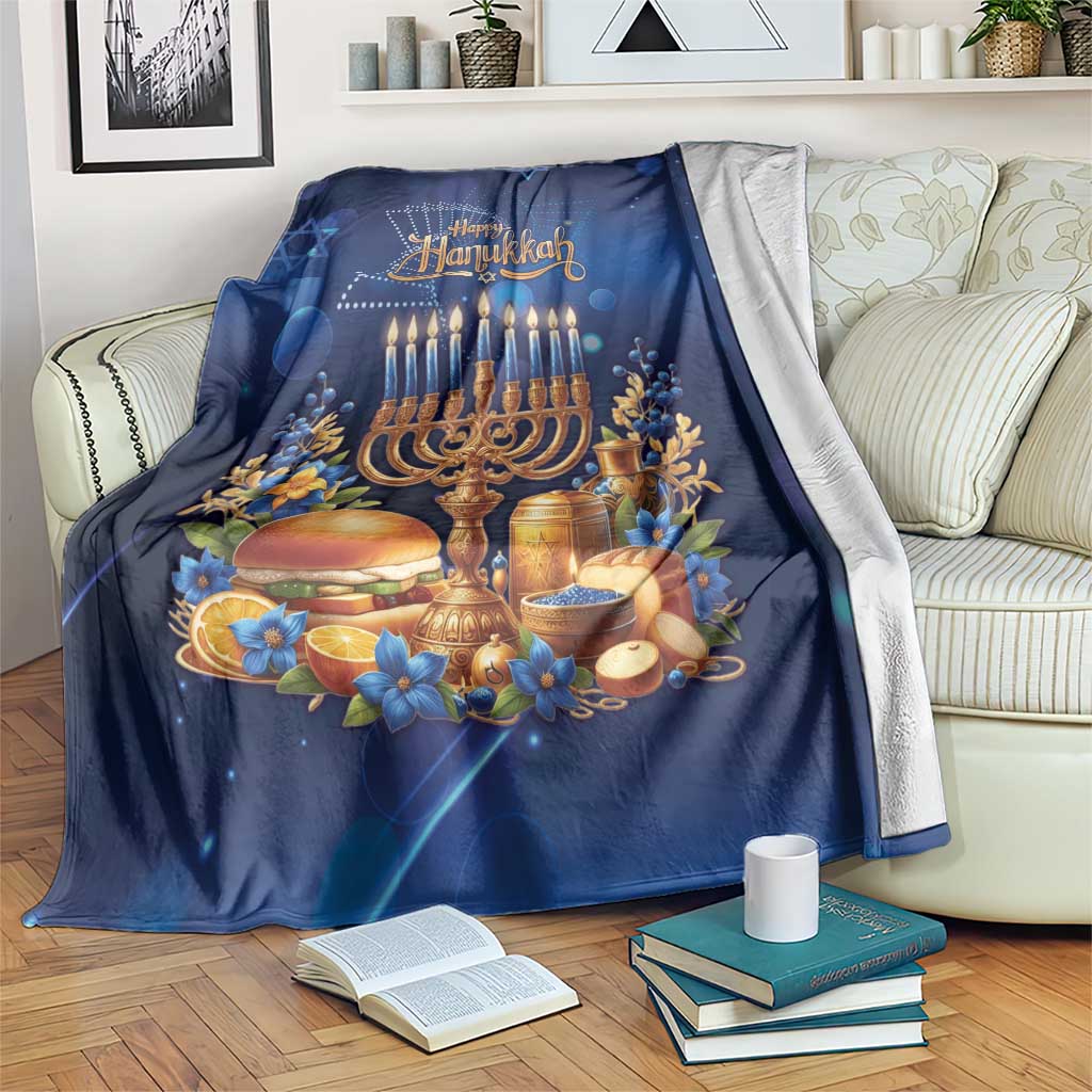 Blue Hanukkah blanket with menorah and 'Happy Hanukkah' graphic, draped on couch.