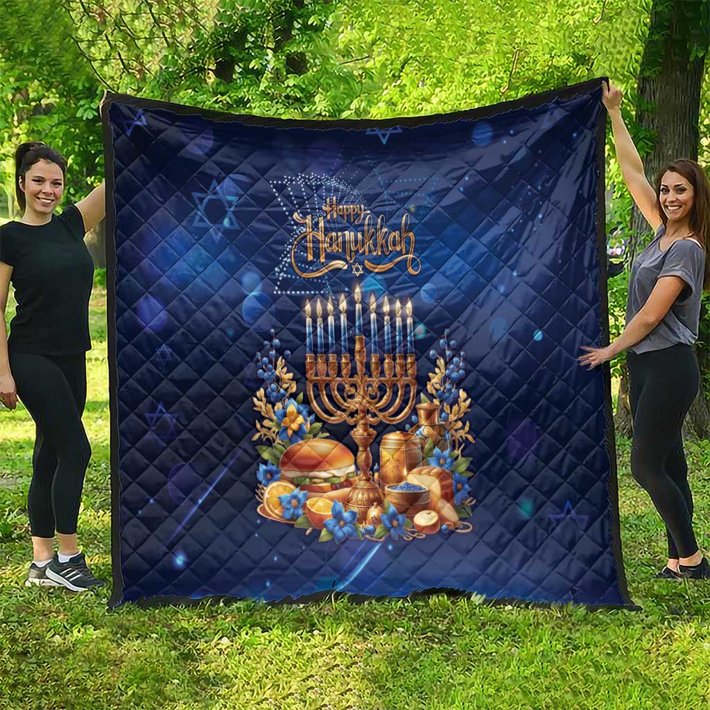 Blue Hanukkah quilt featuring illuminated menorah, candles, and floral border