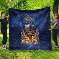 Blue Hanukkah quilt featuring illuminated menorah, candles, and floral border