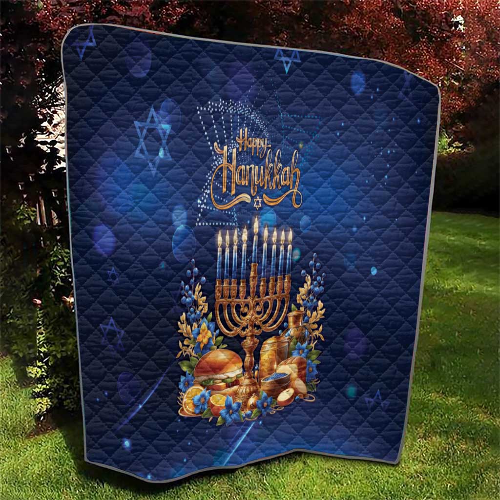Blue quilted Hanukkah blanket with menorah candles and wheat-flower accents
