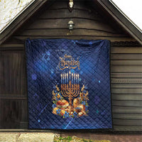 Blue quilted Hanukkah blanket with menorah candles and floral wreath design