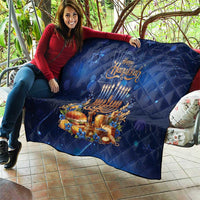 Blue Hanukkah quilt featuring menorah, candles, and star accents