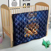 Blue quilted Hanukkah blanket with menorah candles and Happy Hanukkah text