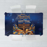 Blue Hanukkah tablecloth with menorah and “Happy Hanukkah” lettering