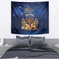Blue Hanukkah wall tapestry featuring gold menorah and candles with floral details