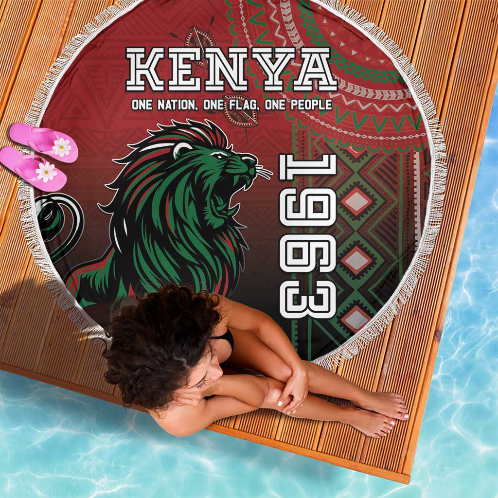 Round red Kenya beach blanket with green lion and patterned flag design, white fringe