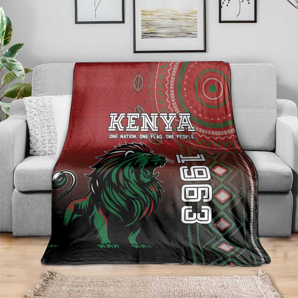Kenya Jamhuri Day blanket on gray sofa, red and dark with green lion design
