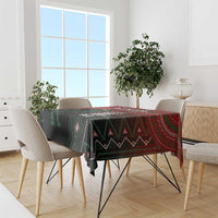 Rectangular tablecloth in red, black, and green with geometric patterns for dining table
