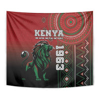 Kenya tapestry close-up with red background, green lion graphic, and circular ornament