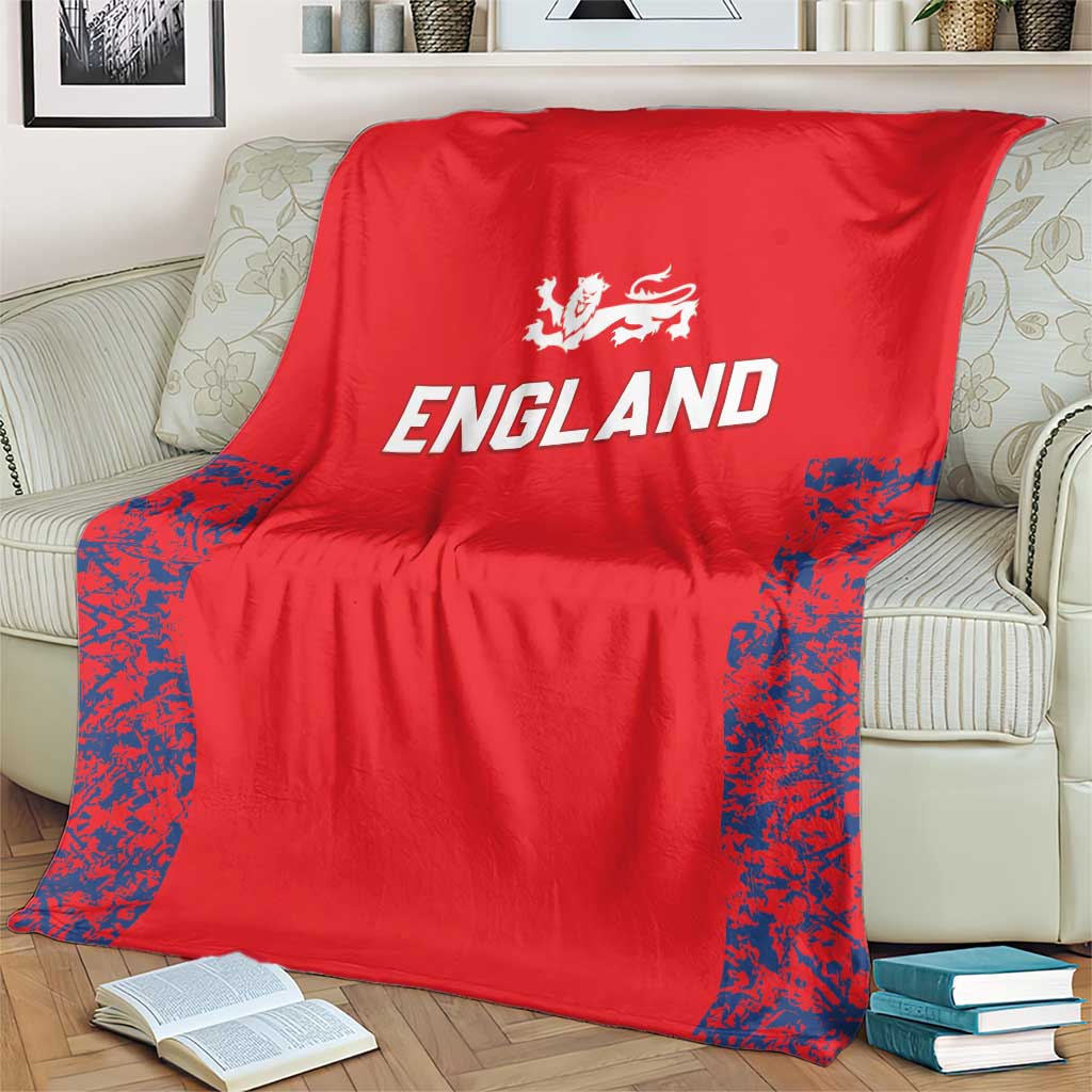 Red England cricket blanket with large ENGLAND text and blue patterned trim