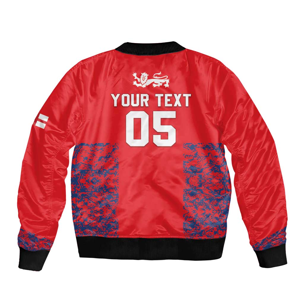 Red bomber jacket back with YOUR TEXT 05 print, blue pocket panels, ribbed hem