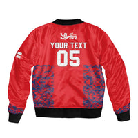 Red bomber jacket back with YOUR TEXT 05 print, blue pocket panels, ribbed hem