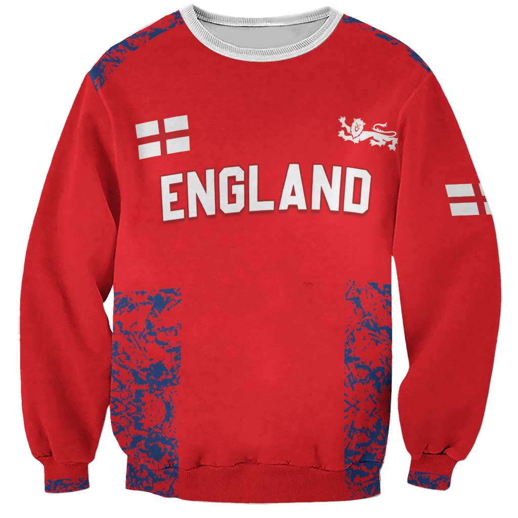 Red cricket sweatshirt with white ENGLAND print, lion crest, and patterned sleeve accents