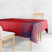 Red England tablecloth with blue lion crest print on table and matching drop sides