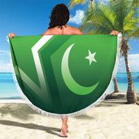 Green round beach blanket featuring Pakistan flag print with white fringed edge