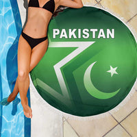 Green round beach blanket with Pakistan flag print and white fringe trim