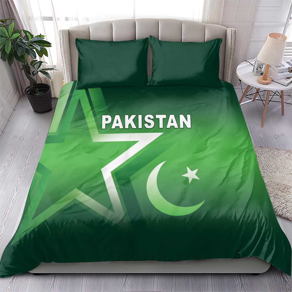Green Pakistan duvet cover and pillow set on bed, Pakistan text with crescent and star