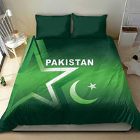 Green Pakistan bedding set with two pillowcases, Pakistan text over crescent and star graphic