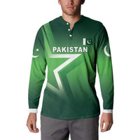 Green long-sleeve button sweatshirt with Pakistan logo and crescent moon at right