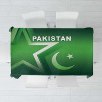 Green Pakistan-themed tablecloth, top view with large flag emblem and text.