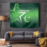 Green Pakistan flag-style tapestry with large star, crescent, and 'PAKISTAN' text