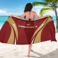 Venezuela football sarong held up, deep red with gold arcs and star details