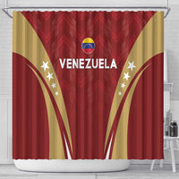 Red shower curtain with Venezuela text and flag emblem, gold star accents, hanging rings.