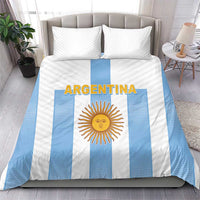 Bedding set with light blue stripes and white panels, ARGENTINA text and sun emblem