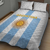 Argentina football quilt bed set on bed, white quilt with light blue sash, sun emblem, pillows