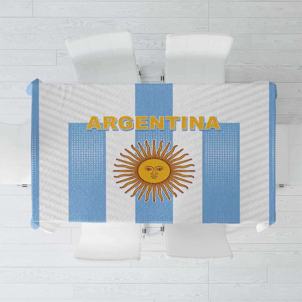 White and blue tablecloth with 'ARGENTINA' text and sun emblem, top view