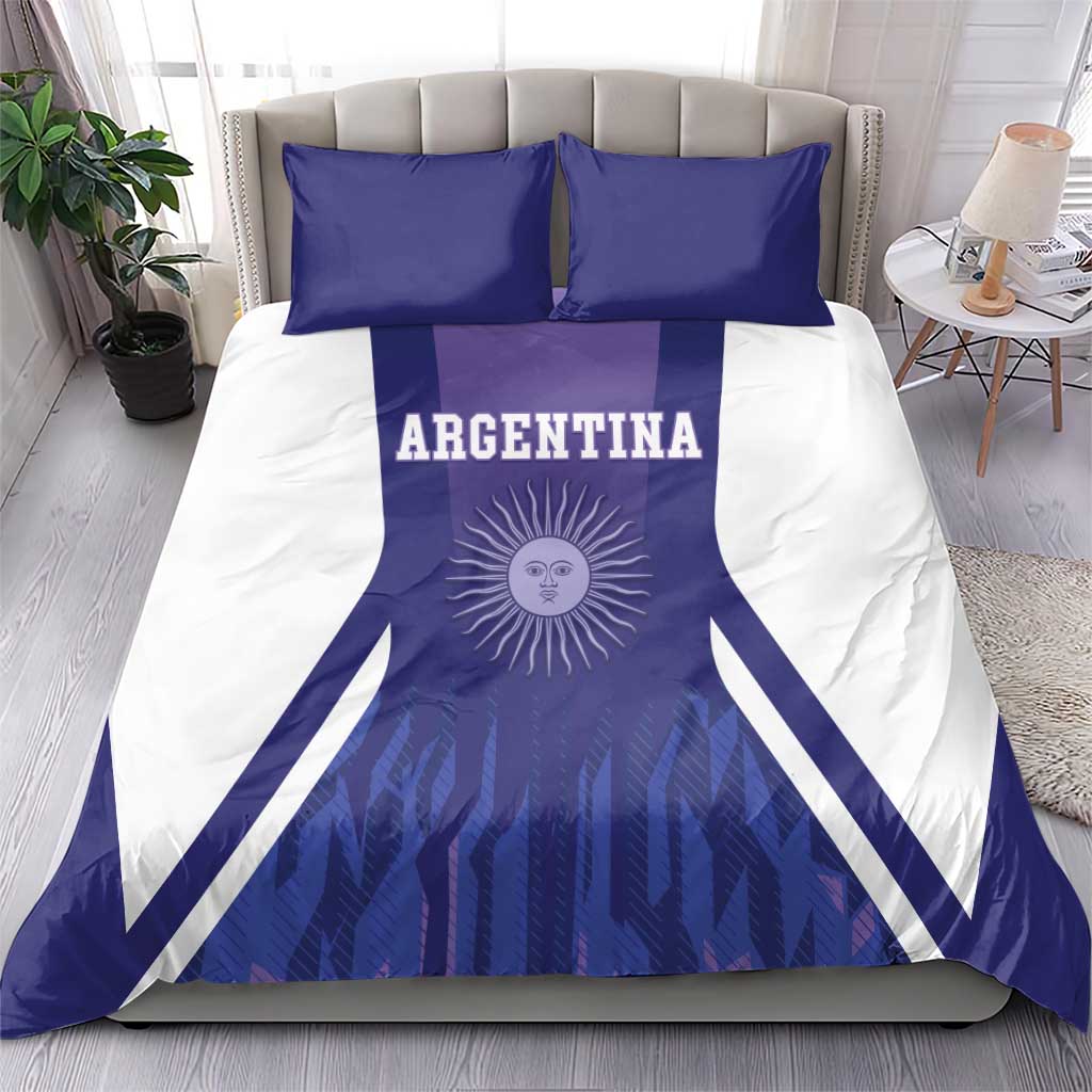 Argentina football bedding set featuring purple sun emblem on white with two blue decorative pillows