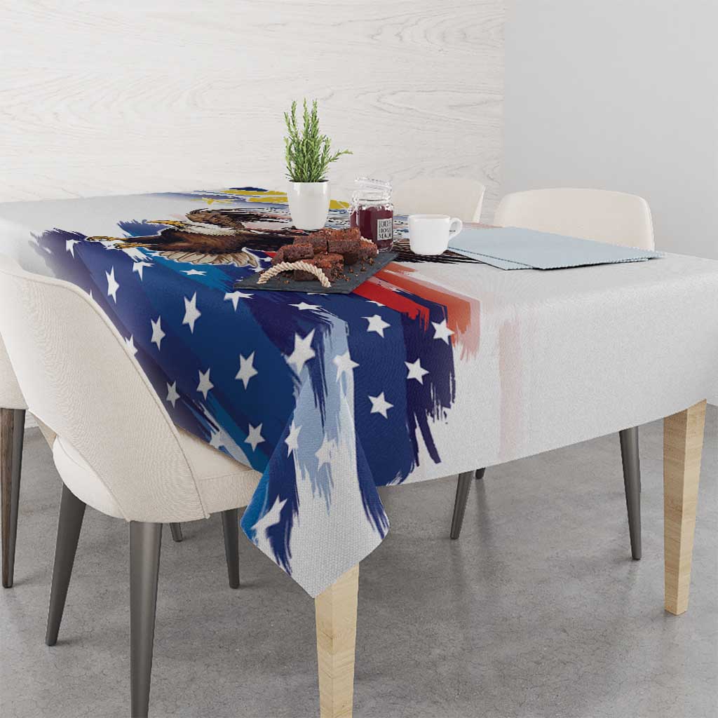 White tablecloth on dining table featuring blue stars and eagle graphic