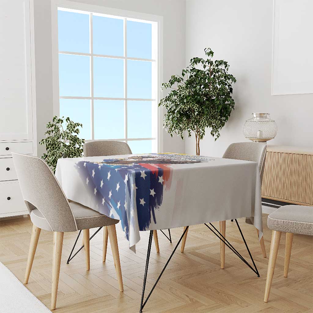 White tablecloth with blue stars and patriotic eagle design on dining table