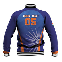Men's blue baseball jacket back with orange 'YOUR TEXT' and '05' graphic, snap front